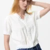 Blusa de algodón con cuello en V y tejido dobby para mujer Blusa de algodón con cuello en V y tejido dobby para mujer