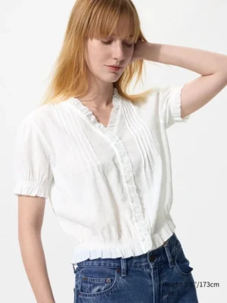 Blusa de algodón con cuello en V y tejido dobby para mujer