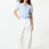 Blusa de algodón con cuello en V y tejido dobby para mujer Blusa de algodón con cuello en V y tejido dobby para mujer