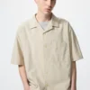 Camisas unisex de cuello abierto | Mangas cortas