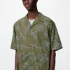 Camisas unisex de cuello abierto | Mangas cortas | Estampadas Camisas unisex de cuello abierto | Mangas cortas | Estampadas