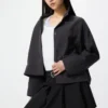 Chaqueta corta de cuello abierto para mujer en pantalones cortos Chaqueta corta de cuello abierto para mujer en pantalones cortos