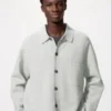 Cárdigan unisex con cuello de camisa y canalé milanés Cárdigan unisex con cuello de camisa y canalé milanés