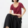 Mini camiseta de cuello redondo con punto calado para mujer Mini camiseta de cuello redondo con punto calado para mujer
