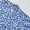Minivestido de mujer con estampado, cuello en V y camisas de manga larga Minivestido de mujer con estampado, cuello en V y camisas de manga larga