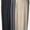 Pantalones anchos con pliegues para hombre