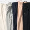 Pantalones de chándal con forro polar HEATTECH para mujer Pantalones de chándal con forro polar HEATTECH para mujer
