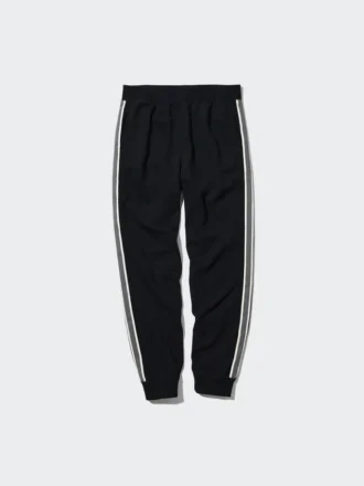 Pantalones de chándal unisex con rayas laterales | Talla alta Pantalones de chándal unisex con rayas laterales | Talla alta
