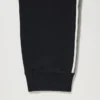 Pantalones de chándal unisex con rayas laterales | Talla alta Pantalones de chándal unisex con rayas laterales | Talla alta