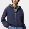 Parka corta cortavientos para mujer con pantalones cortos Parka corta cortavientos para mujer con pantalones cortos