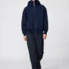 Sudadera unisex oversize con capucha y cremallera completa